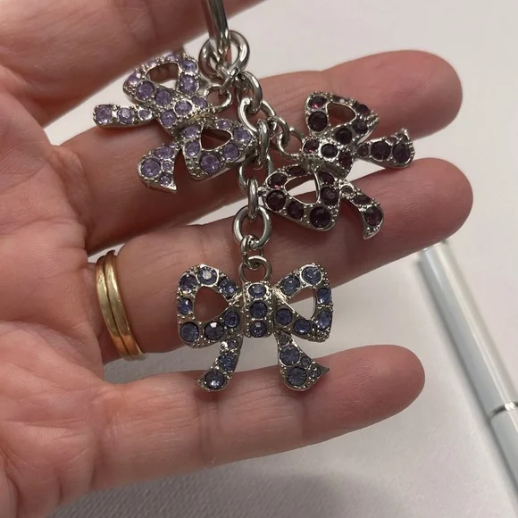 Elegant Coach Bow Keychain with Multicolor Crystals and a White Coach Pen - Picture 2 of 6